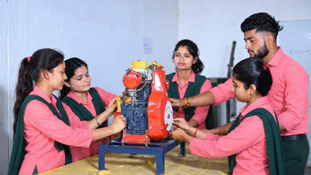 Students working together on an engine in the laboratory